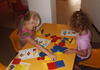 Children playing with shapes